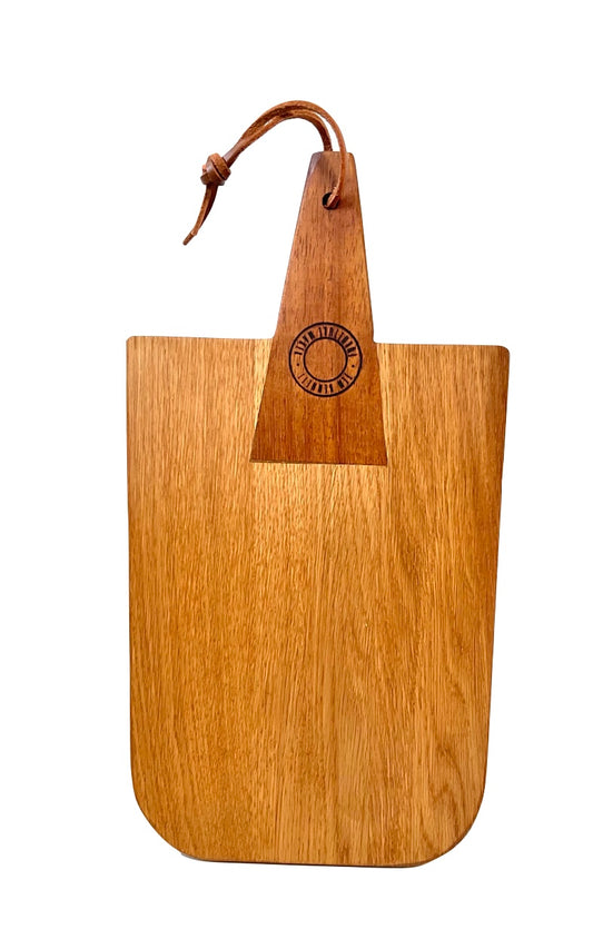Medium sized oak chopping/ serving board with contrasting handle.