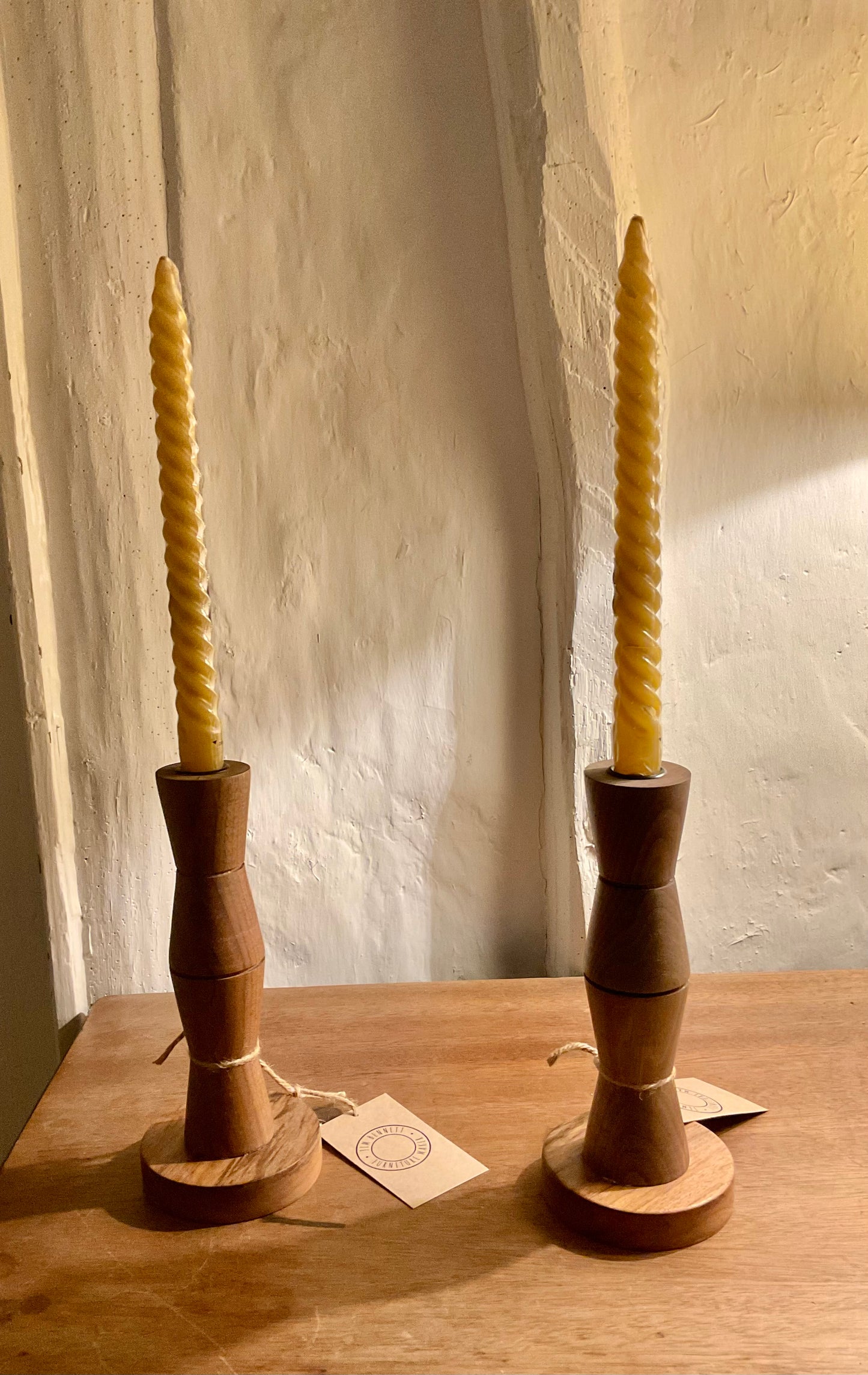 Solid English walnut candlestick.